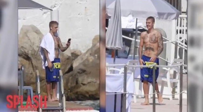28.06 | Justin Bieber é fotografado na praia em Mónaco, Europa